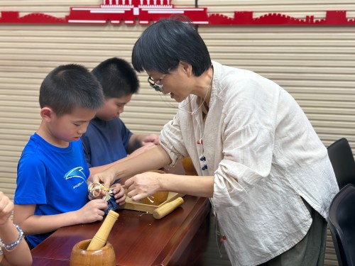 7月23日,“非遗巧手工?夏日趣成长” 暑期手工夏令营系列活动之闻香识药?巧制香囊11 永利皇宫